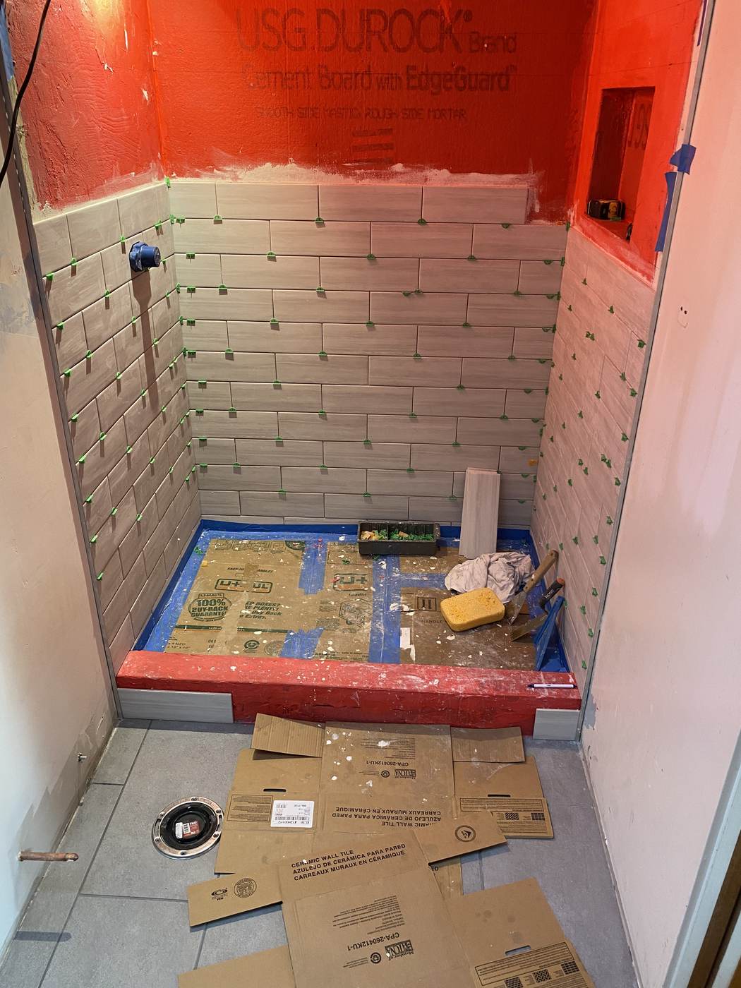 Membrane on the walls and pan before any tile goes up.