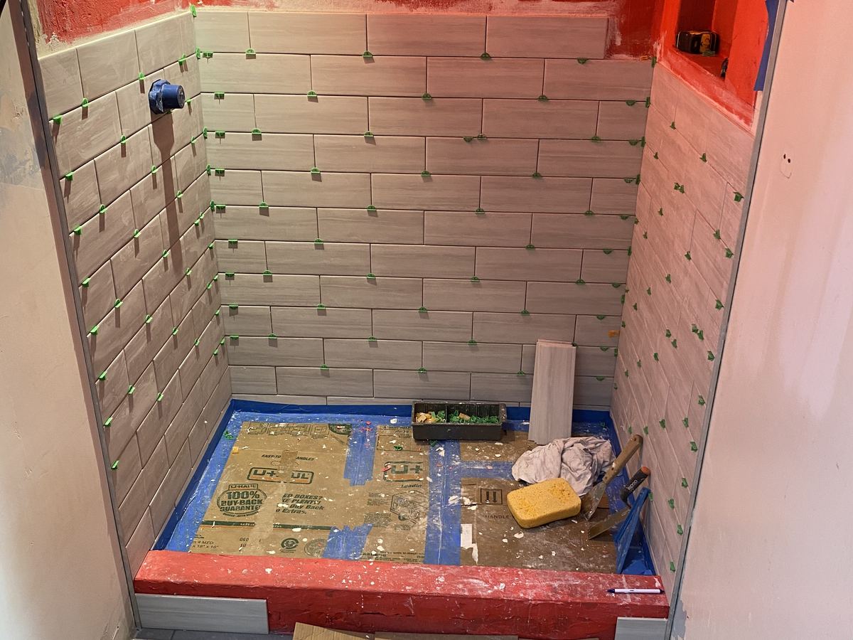 Shower Waterproofing. Membrane on the walls and pan before any tile goes up.
